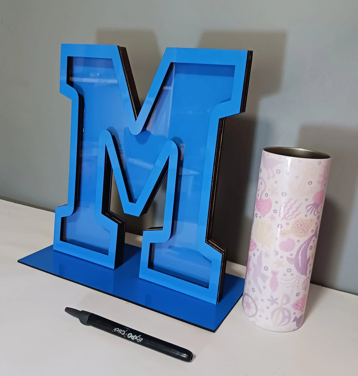 Custom wooden letter piggy bank with personalized design