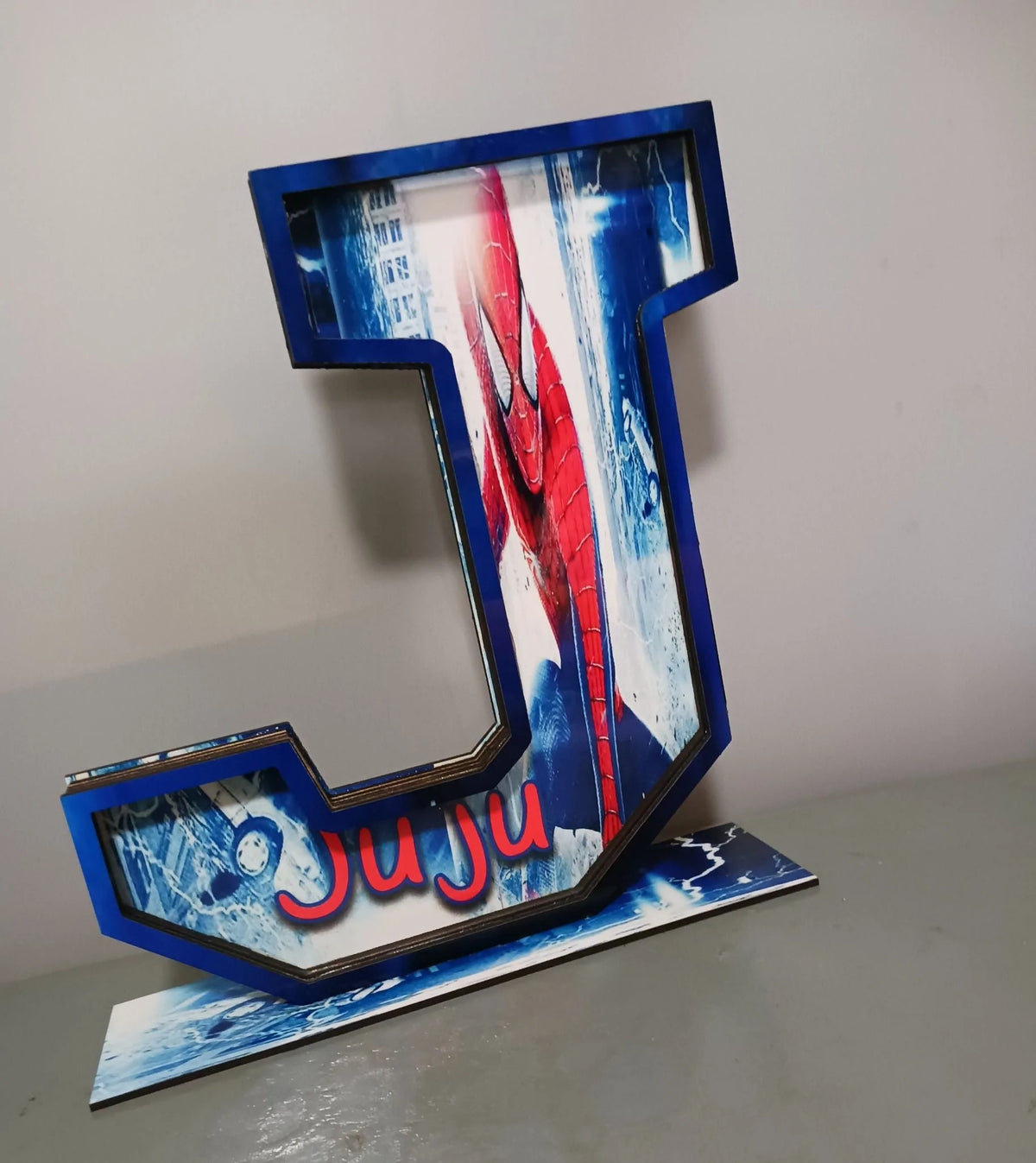 Custom wooden letter piggy bank with personalized design