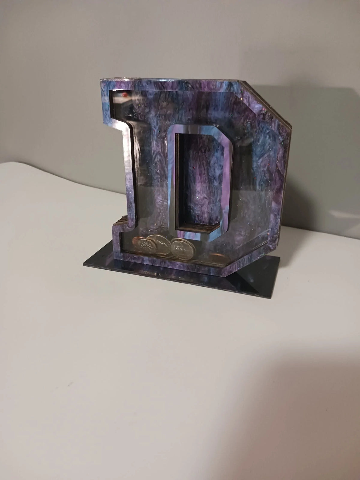 Custom wooden letter piggy bank with personalized design